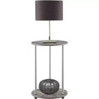 Table d'appoint ronde à deux niveaux HomeStock Belmont avec pieds en acier inoxydable, étagères robustes en panneaux de particules et style moderne contemporain.