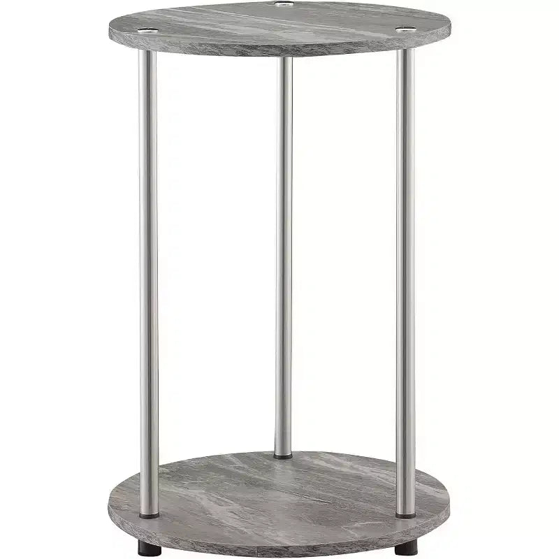 Table d'appoint ronde à deux niveaux HomeStock Belmont avec pieds en acier inoxydable, étagères robustes en panneaux de particules et style moderne contemporain.