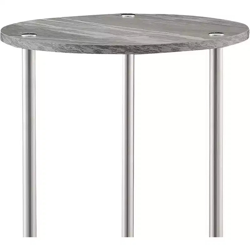 Table d'appoint ronde à deux niveaux HomeStock Belmont avec pieds en acier inoxydable, étagères robustes en panneaux de particules et style moderne contemporain.