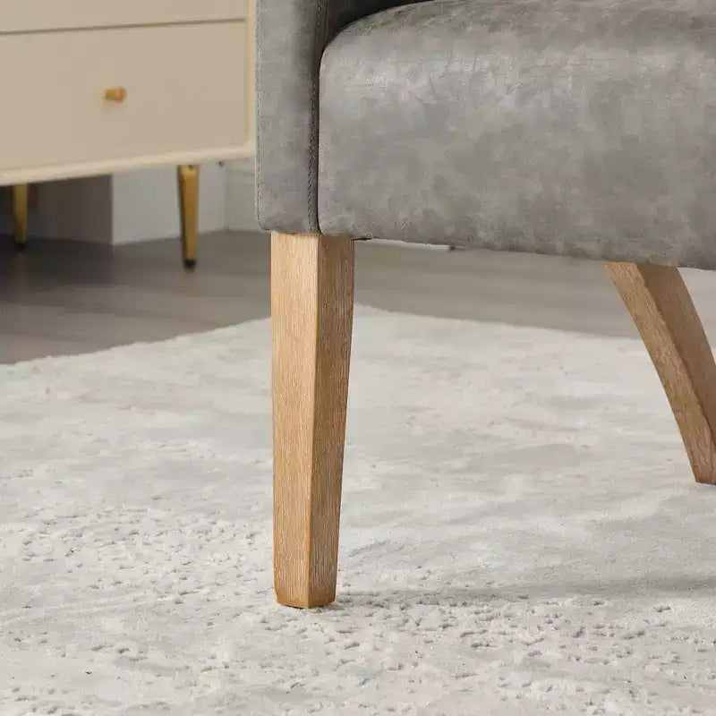 Chaise d'appoint moderne Homy Casa avec dossier incurvé, revêtement en similicuir et pieds en bois