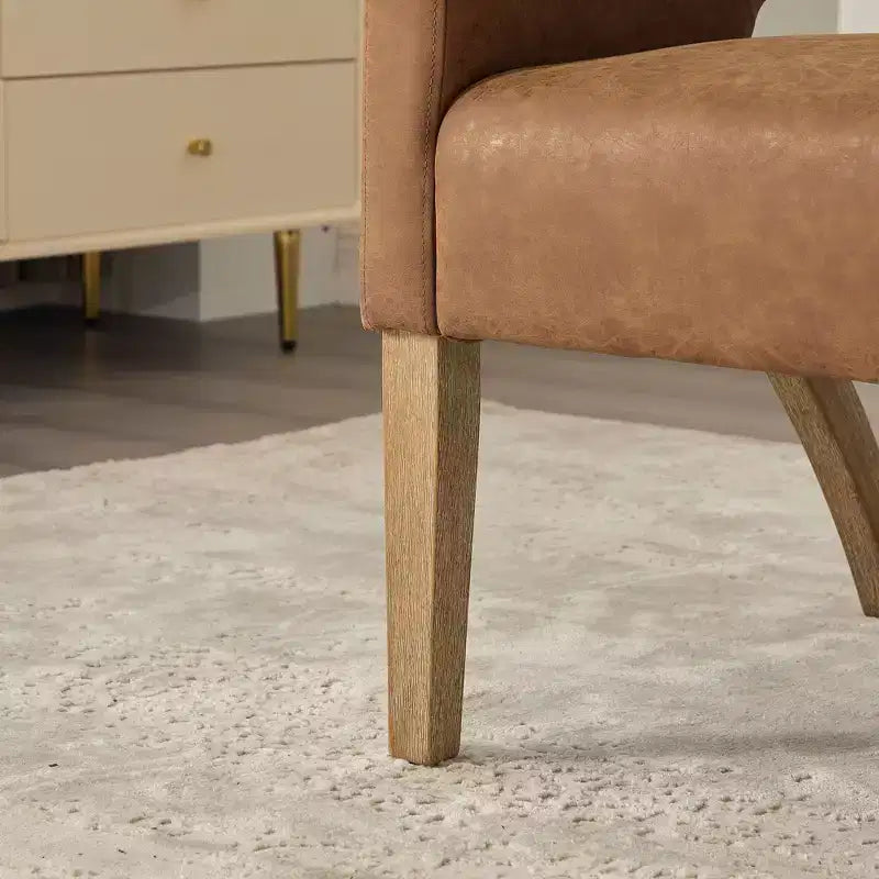 Chaise d'appoint moderne Homy Casa avec dossier incurvé, revêtement en similicuir et pieds en bois