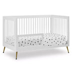 Lit de bébé 4-en-1 Sloane de Delta Children convertible en lit pour tout-petit