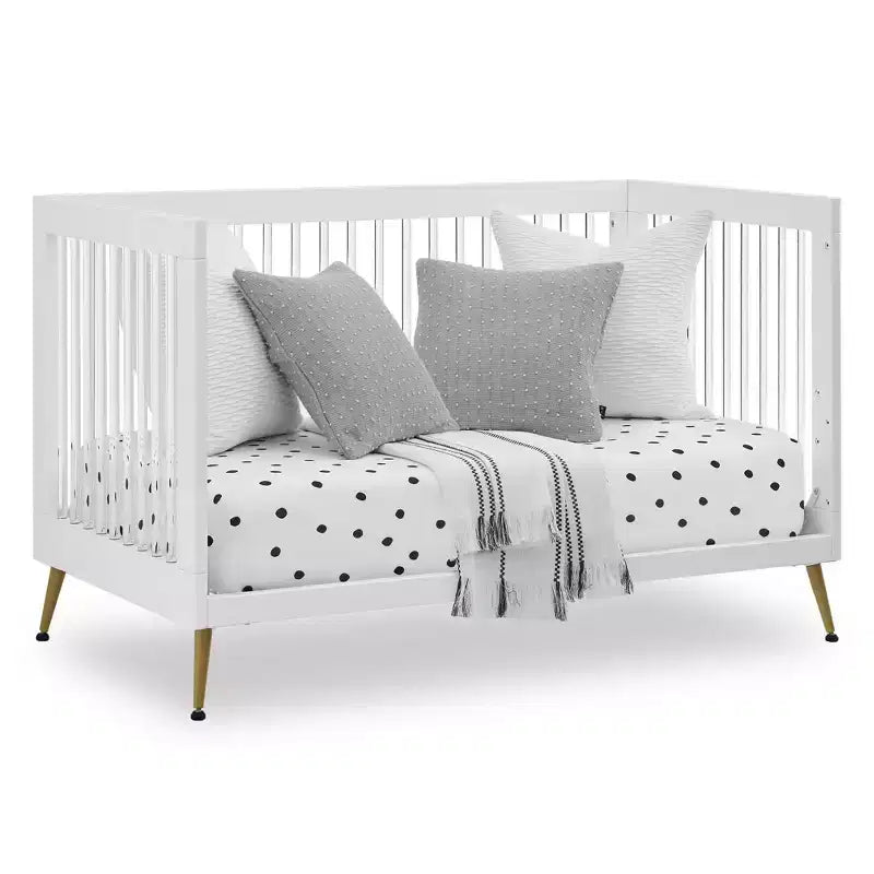 Lit de bébé 4-en-1 Sloane de Delta Children convertible en lit pour tout-petit