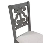 Ensemble de salle à manger rond 5 pièces en bois avec pieds de forme spéciale et dossier de chaise évidé au design exquis pour la cuisine