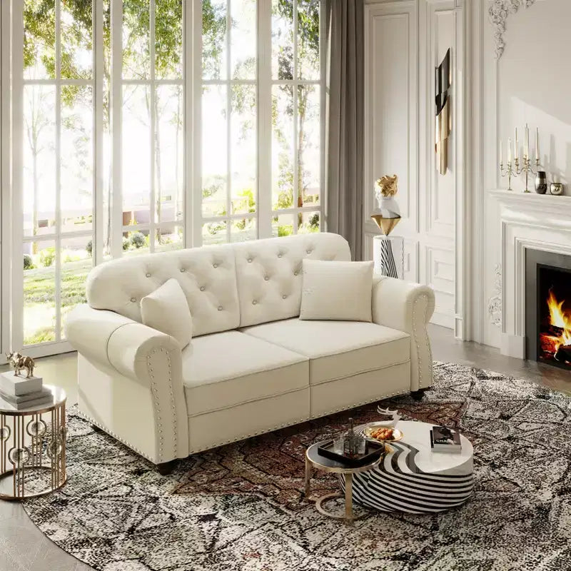 Causeuse Eloise 63 de GDFStudio en velours capitonné style Chesterfield avec garniture cloutée et accoudoirs roulés