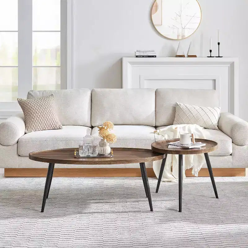 Ensemble de 2 tables basses rondes et ovales Paxton du milieu du siècle Noyer : Rangement, pieds coniques, surface stratifiée, style scandinave