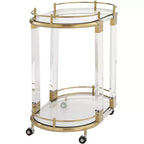 55 Downing Street Chariot de bar ovale Adaline de 75 cm de large en acrylique transparent et or