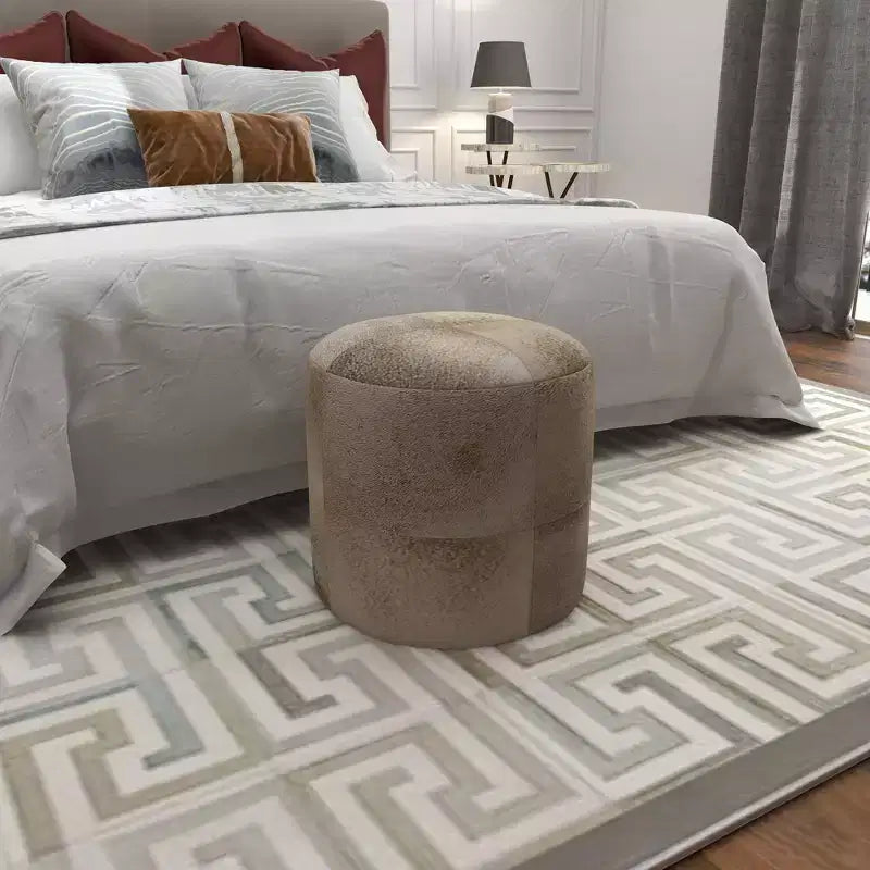 Pouf Repose-pieds Rond en Cuir de Vachette Contemporain - Olivia & May