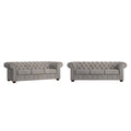 Canapé Chesterfield Gdansk avec accoudoirs arrondis et capitonnés