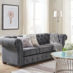 Canapé Chesterfield Gdansk avec accoudoirs arrondis et capitonnés