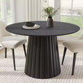 Dovelina Black Round Dining Table Artificial Wood Dining Room Table Personalized Dining Table with Designer Table Base