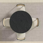 Table à manger ronde Dovelina noire, en bois artificiel, personnalisée avec un piètement design