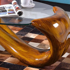 Table basse ovale moderne avec plateau en verre et base en métal